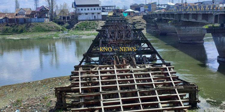 Old bridge set on fire in Sopore village