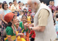 School girls Tie Rakhi To PM Narendra Modi On Raksha Bandhan