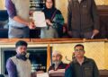 DC Ganderbal hands over ex-gratia relief to victim families of road accidents