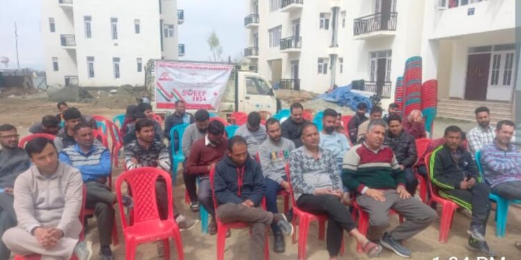Awareness programme under SVEEP held  at TranBANDIPORA, MARCH 25: In a significant step towards promoting electoral participation and strengthening democracy, a special awareness programme under Systematic Voters’ Education and Electoral Participation (SVEEP) was today conducted at  Migrant transit accommodation Odina Sumbal.   The programme was held under the patronage of Chief Education Officer Bandipora/ Nodal Officer Manpower and Trainings, Dr G .M. Puju.    The program was aimed at enlightening the inhabitants of transit accommodation about the crucial importance of their vote in democratic process.   The event was further enriched by the valuable participation of members from the civil society, who eloquently spoke on the occasion, highlighting the vital role of vote in strengthening democracy.   The speakers highlighted the direct impact of voting on the quality of governance and the everyday lives of citizens, underscoring the fact that every single vote counts towards shaping the future of the nation.  In addition to disseminating key information about the voting process, practical guidance was provided regarding how migrant employees can vote at  their current residence.  SVEEP Coordinator, Arsalan Habib and other concerned were present at the event.sit Accommodation Odina Sumbal