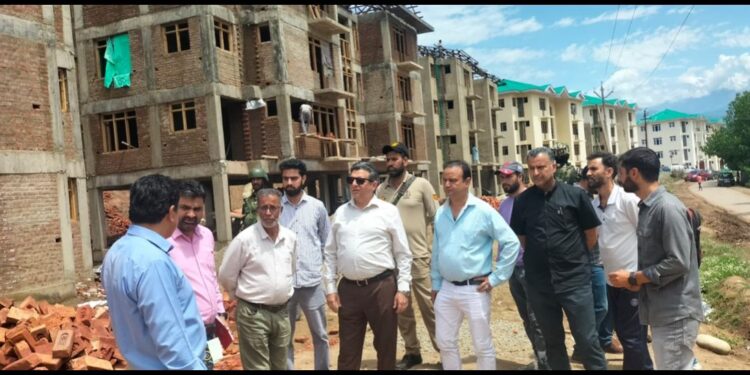 Dr Karwani reviews construction of transit accommodations for PM package employees in South Kashmir