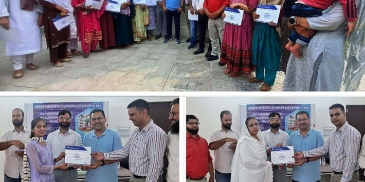 Director JKEDI awards certificates to Tejaswini Scheme beneficiaries
