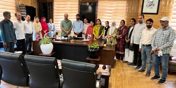 Director Agriculture held interacts with a group of farmers from Rajouri