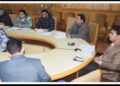 Div Com Kashmir reviews functioning of PHE Schemes