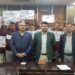 JMC Commissioner gives away Dogri version PM SVAinidhi plates to street vendors