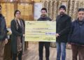 DC Kupwara hands-over Rs.12 lakh cheque to fish farmer for establishment of Trout Feed Mill
