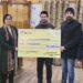 DC Kupwara hands-over Rs.12 lakh cheque to fish farmer for establishment of Trout Feed Mill