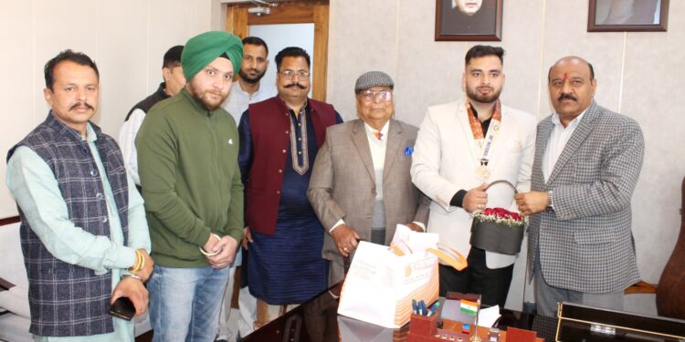 Deputy Chief Minister felicitates Bronze medalist, Rajat Singh