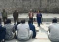DC Udhampur interacts with sanitation workers at Devika Ghat