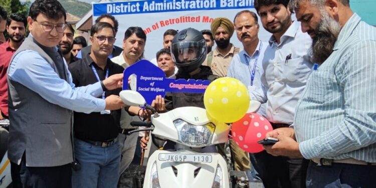 DC Baramulla distributes 27 retrofitted motorized tricycles among specially-abled
