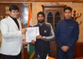 DC Ganderbal hands over sanction letters to beneficiaries under BLC component of PMAY-U 2.0