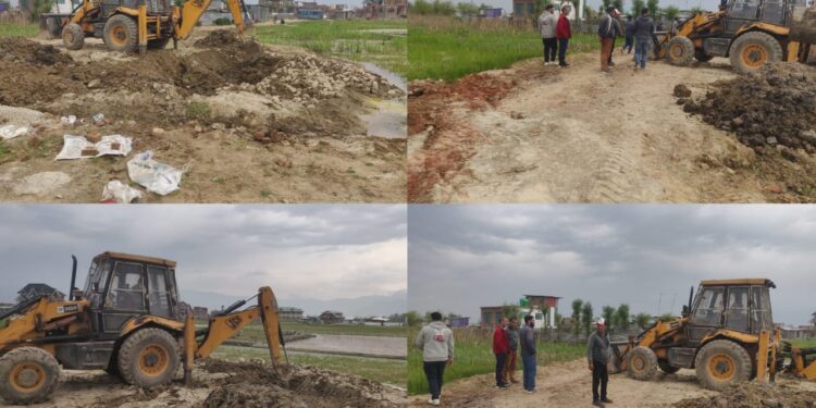 Revenue department Budgam conducts anti encroachment drive in Bemina