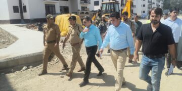 Dr Karwani inspects construction work in Transit accommodations for PM Package Employees